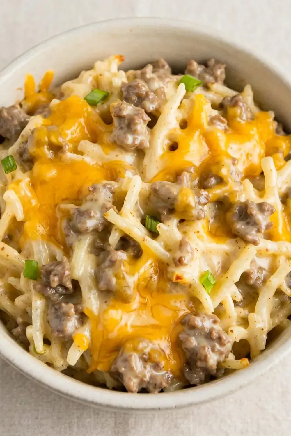 Crockpot Cheesy Beef and Hash Brown Casserole